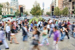 This is a picture of people walking on a street. Parts of the picture are blurred to show motion and create a hurried feeling. This is how I feel if I am not living an intentional life. 